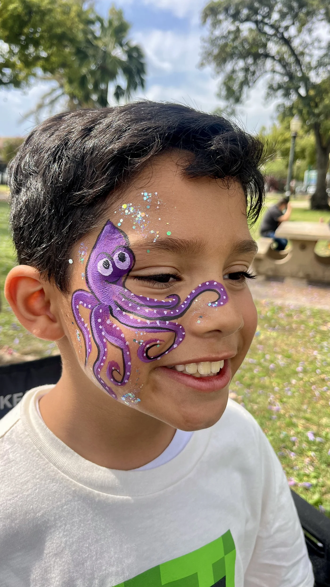 Full face flower and bee face painting at a birthday party in Los Angeles by Happy Faces LA