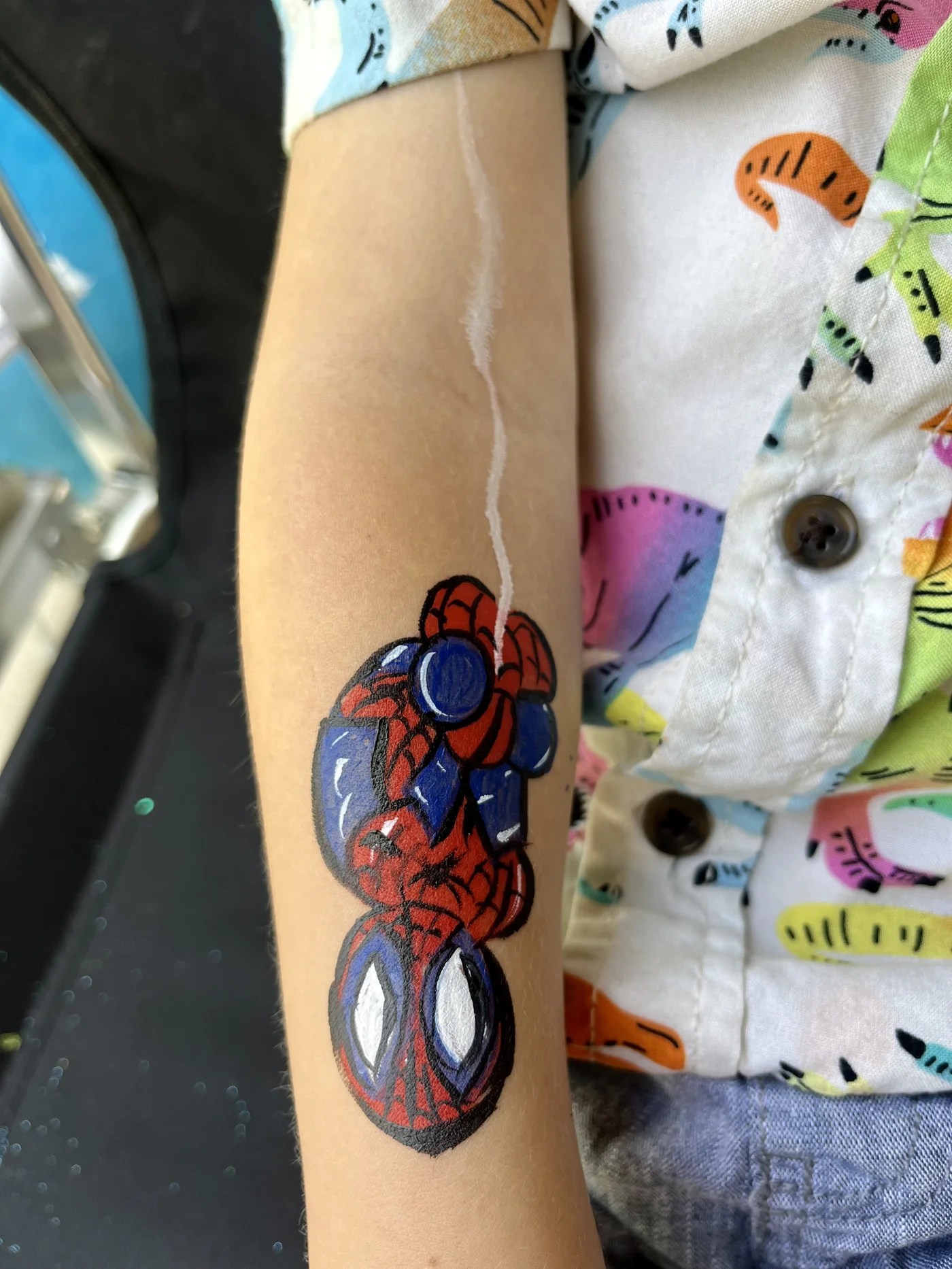 Bee and flower cheek painting by Happy Faces LA at a birthday party in Los Angeles