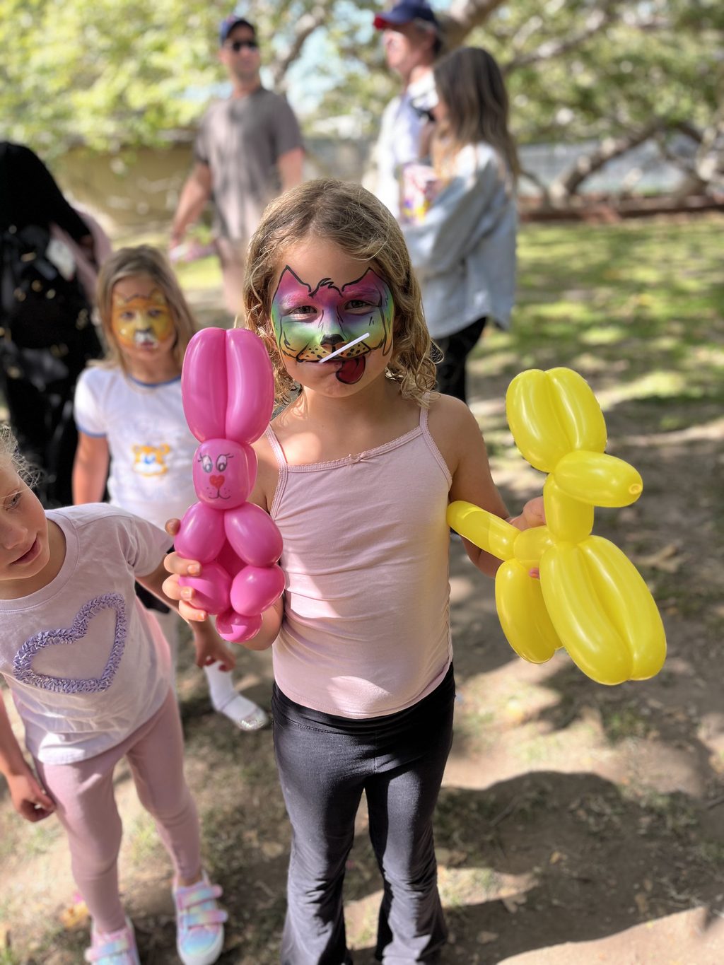 Pink and Yellow Balloon Animals by Happy Faces LA.