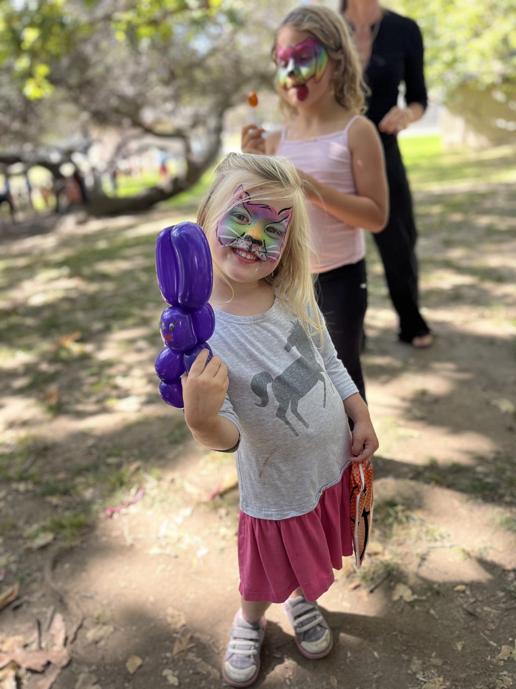 Purple Balloon Animal by Happy Faces LA.