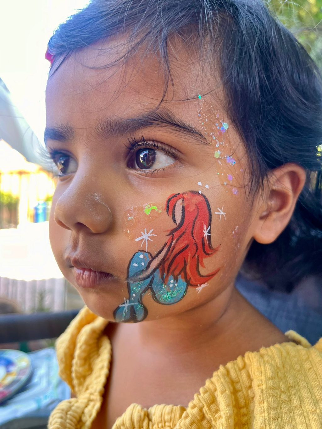 Mermaid-Inspired Cheek Art by Happy Faces LA.