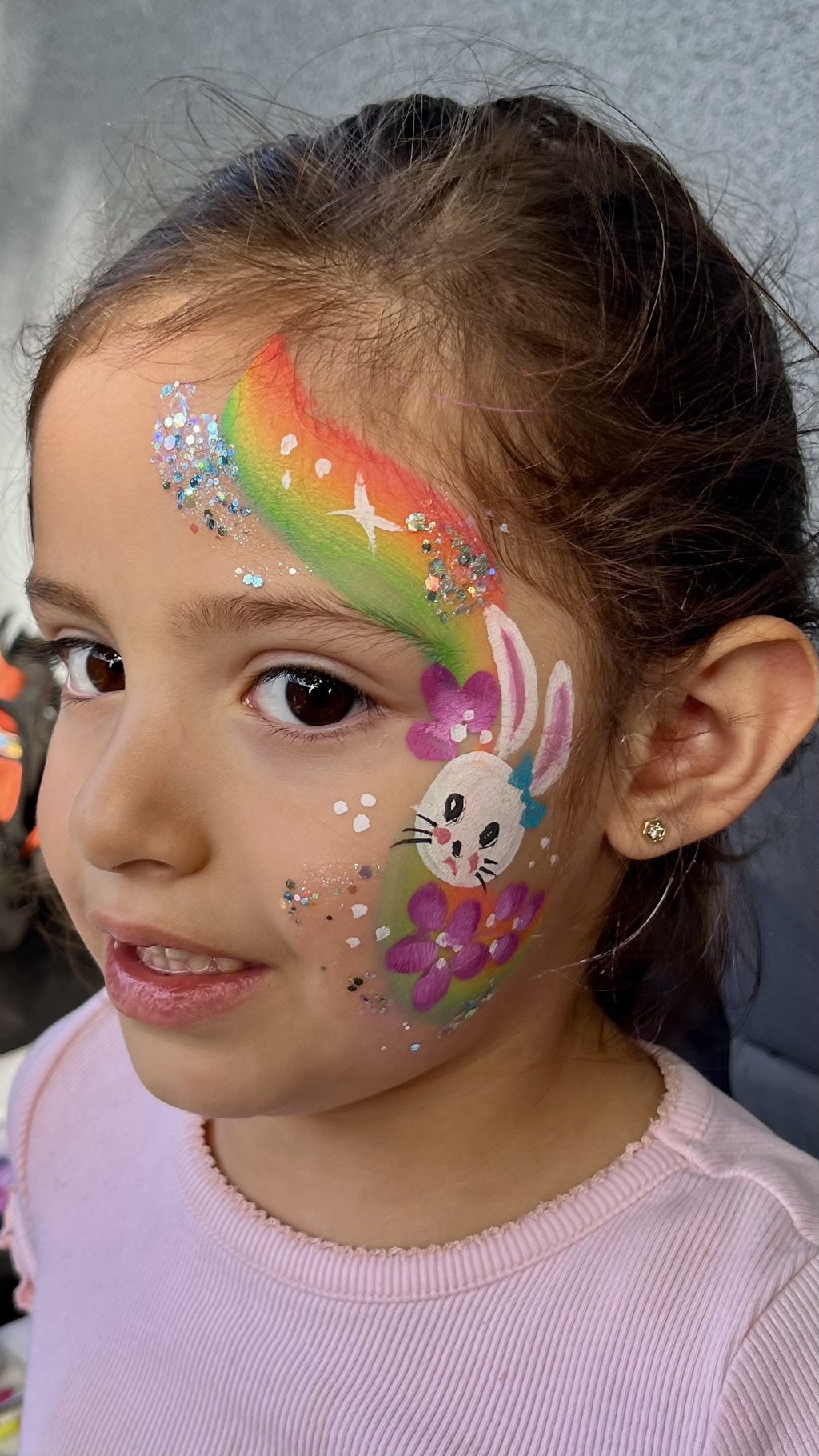 Bunny with Rainbow and Flowers Cheek Art by Happy Faces LA.