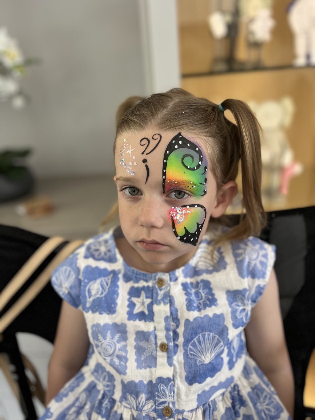 Rainbow Butterfly Full-Face Design with Black Wing Detail by Happy Faces LA.