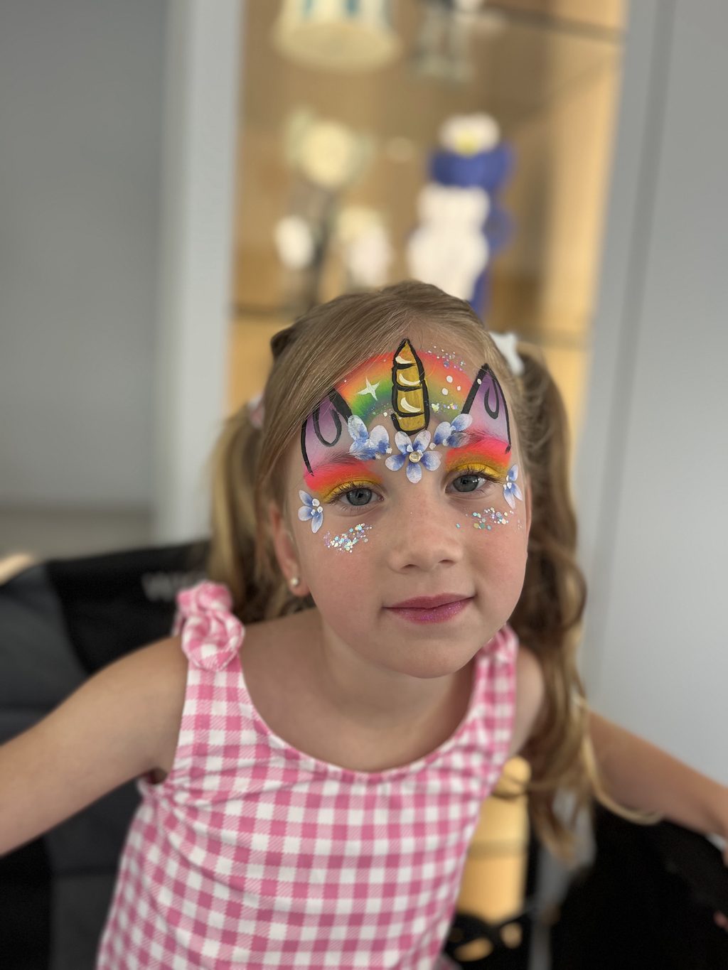 Rainbow Unicorn Full-Face Design with Glitter and Flowers by Happy Faces LA.