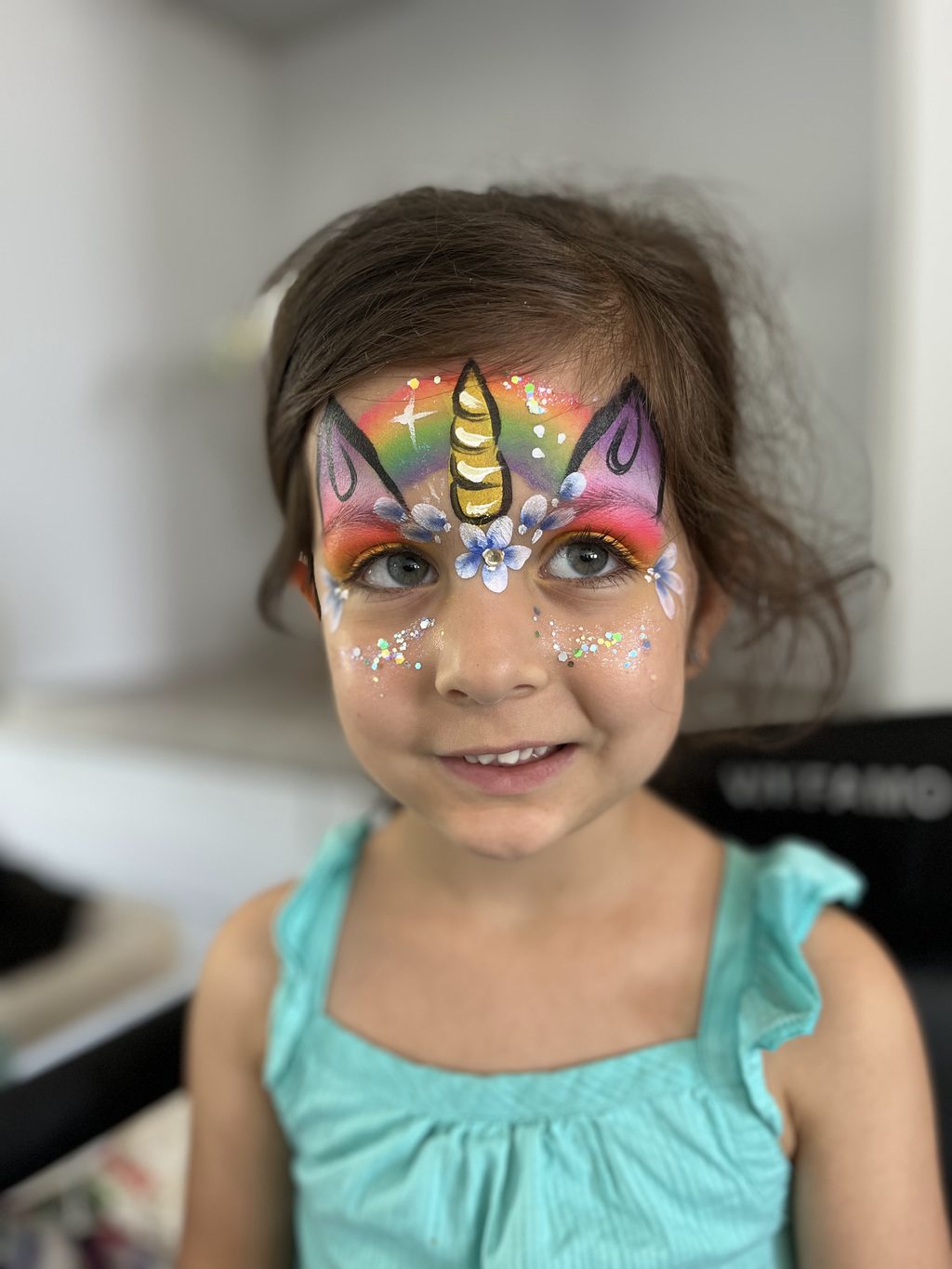 Rainbow Unicorn Full-Face Design with Glitter and Flowers by Happy Faces LA.